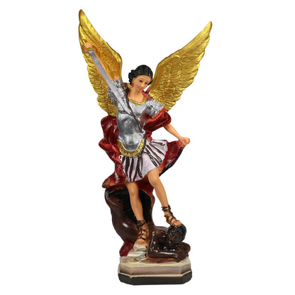 Statue of an angel with wings spread, holding a sword on a white background