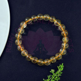 Premium Golden Rutile Quartz Crystal Bracelet with Transparent Beads and Golden Rutile Patterns