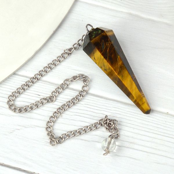 tiger eye Six faceted dowser pendulum charged by Reiki Grandmaster