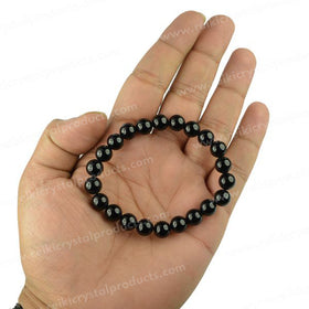 Black Onyx gemstone bracelet with round beads for strength and stability
