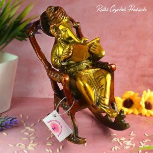 Brass Lord Ganesha Statue Sitting on a Chair